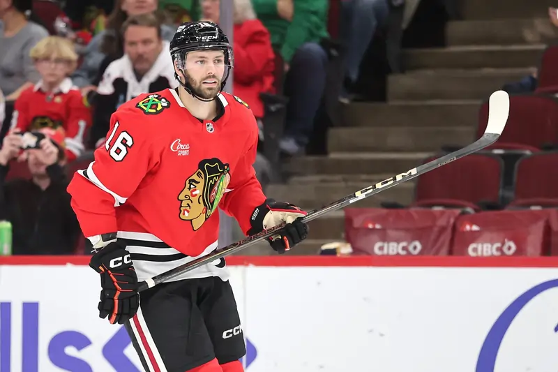 Jason Dickinson, a Chicago Blackhawks forward, skating during warmups before his season-ending wrist injury.